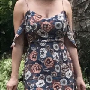 Blue floral midi dress with straps and ruffle sleeves